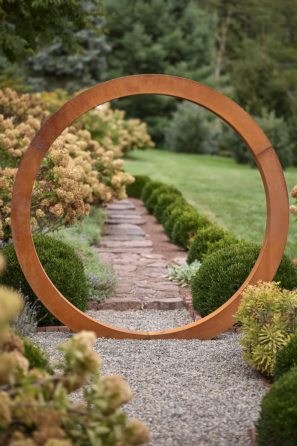 Corten steel Moongate sculpture, contemporary circular garden arch for luxury landscapes