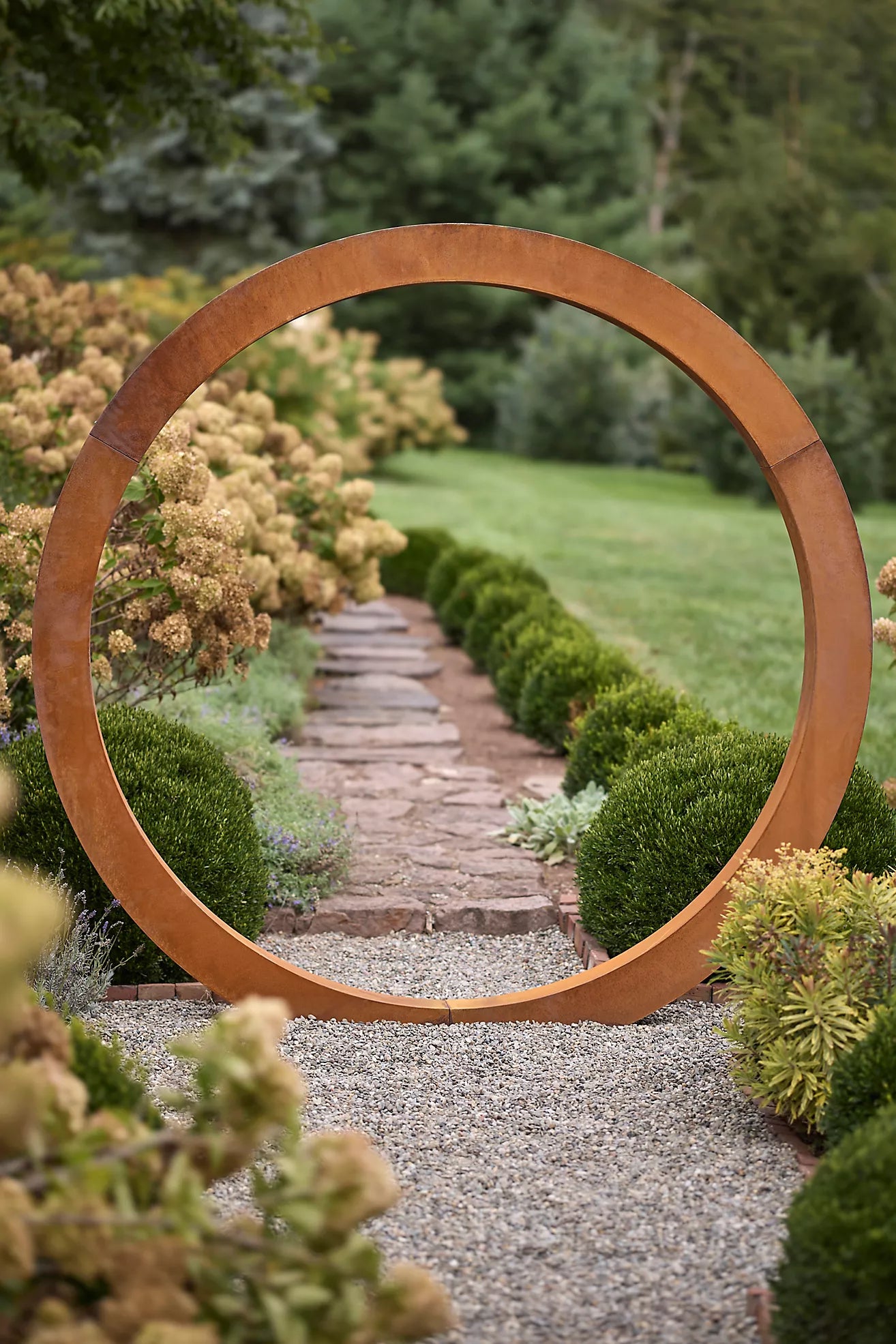 Corten steel Moongate sculpture, contemporary circular garden arch for luxury landscapes